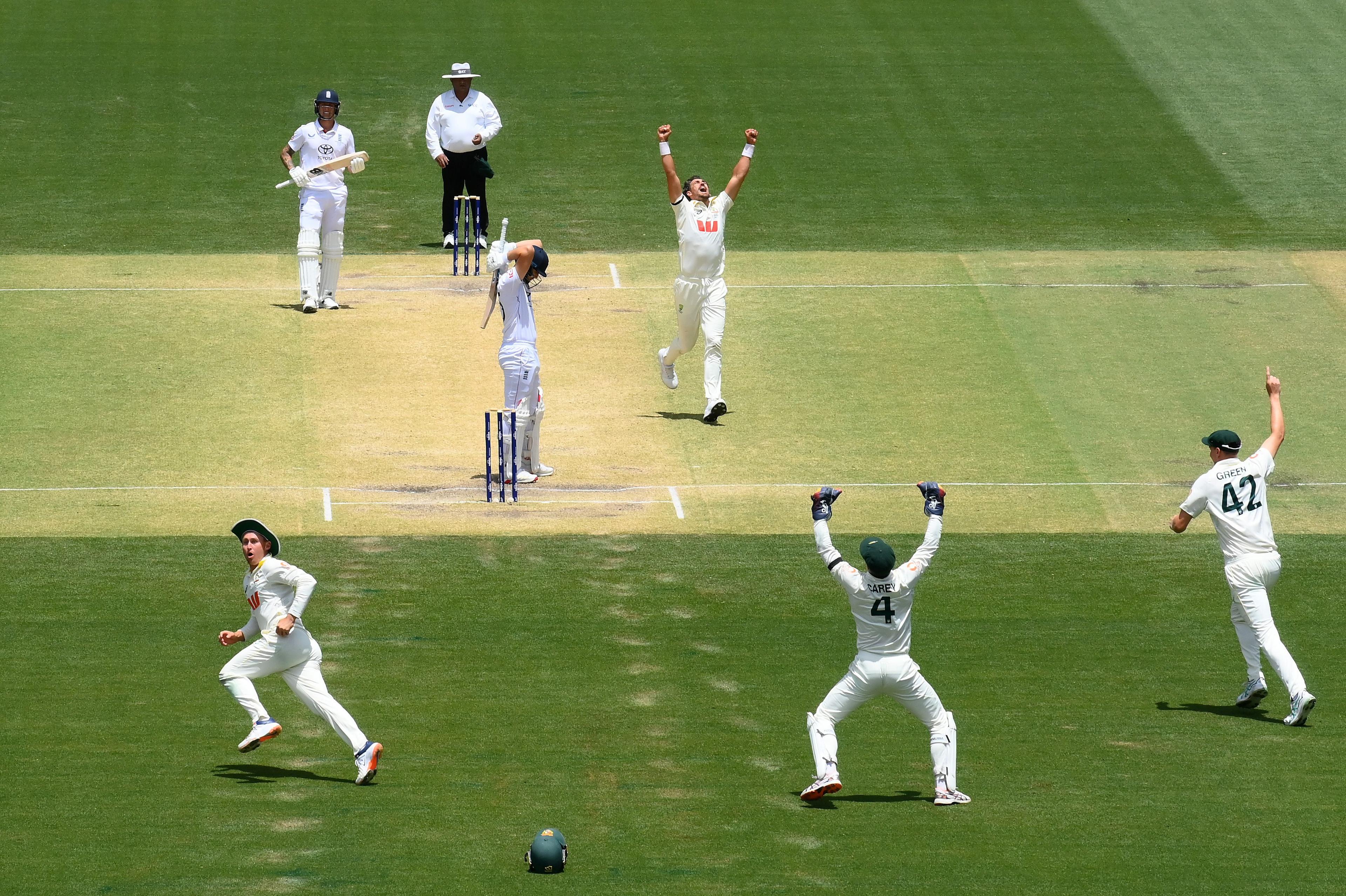 Mitchell Starc and his Australia team-mates celebrate the wicket of England's Will Jacks on day five of the third Ashes Test in Adelaide