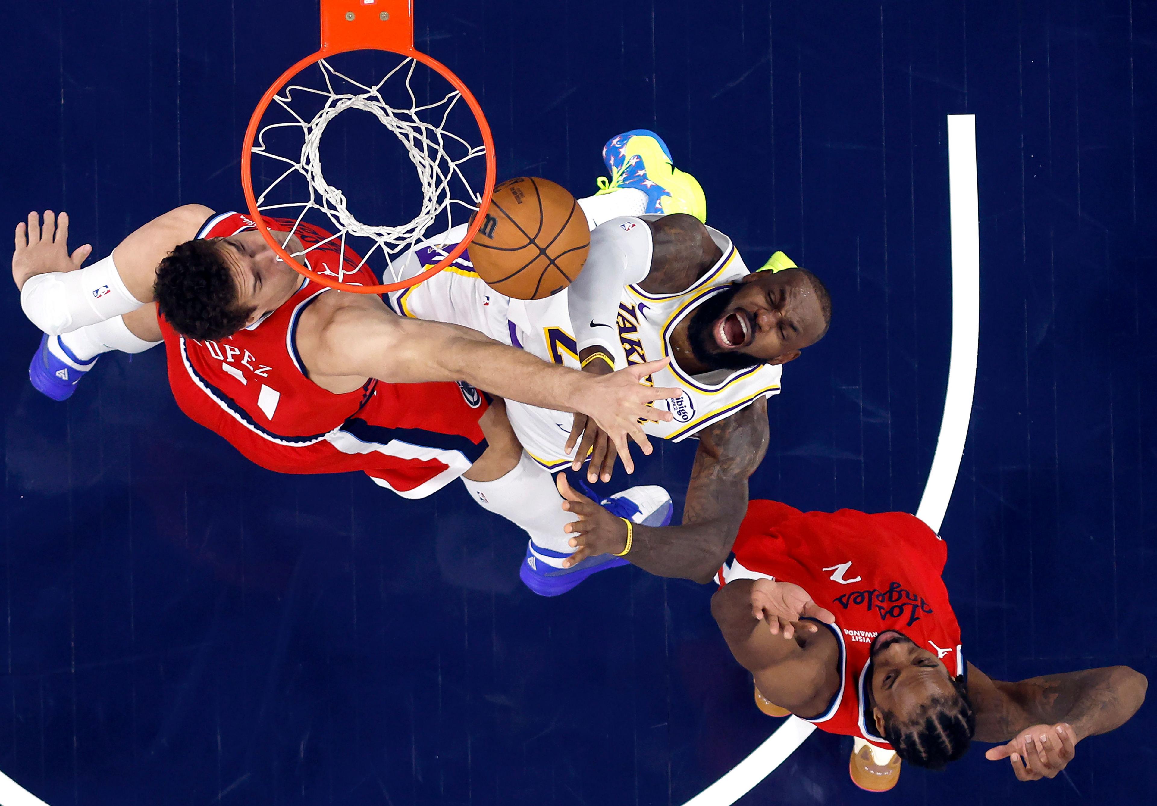 Los Angeles Lakers superstar Lebron James takes a shot against their city rivals the Clippers in the NBA fixture at Intuit Dome in Inglewood, California